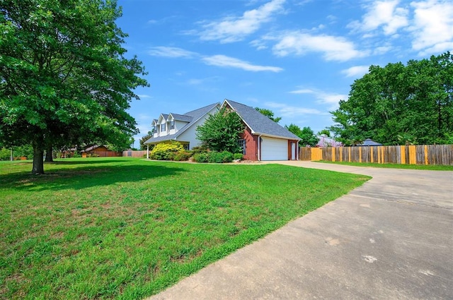 exterior space with a front yard and a garage