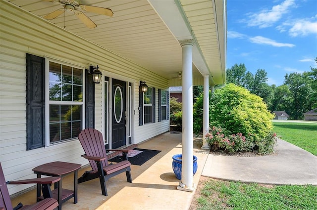 view of patio / terrace with ceiling fan and a porch