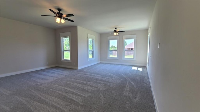 1425 W Harvard Way, Mustang, OK 73064 - spare room with baseboards, a ceiling fan, and carpet floors