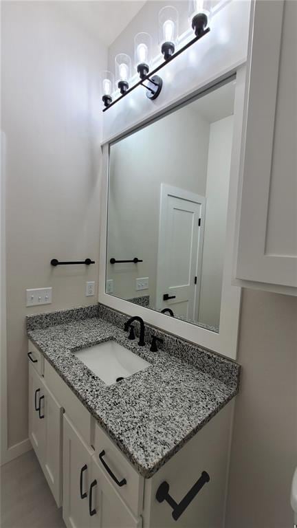 1425 W Harvard Way, Mustang, OK 73064 - half bath featuring vanity and baseboards