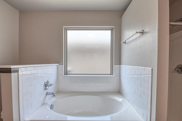 bathroom with a washtub