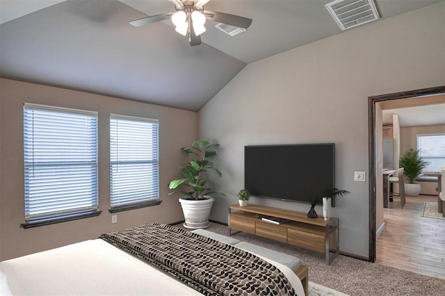 bedroom with vaulted ceiling and ceiling fan