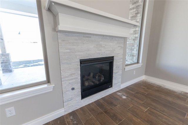 room details featuring a tile fireplace