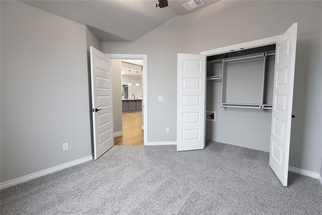 1733 Taines Turn, Norman, OK 73072 - unfurnished bedroom featuring visible vents, carpet flooring, baseboards, and lofted ceiling