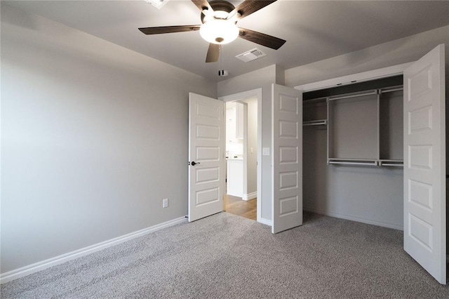 1733 Taines Turn, Norman, OK 73072 - unfurnished bedroom featuring a ceiling fan, carpet, visible vents, baseboards, and a closet