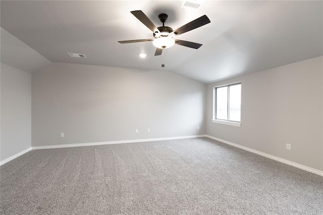 1733 Taines Turn, Norman, OK 73072 - spare room featuring visible vents, baseboards, carpet, ceiling fan, and vaulted ceiling
