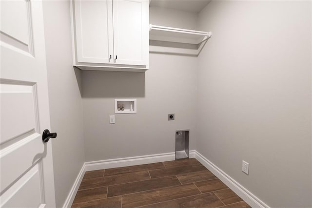 1733 Taines Turn, Norman, OK 73072 - laundry area featuring electric dryer hookup, baseboards, wood finish floors, and washer hookup