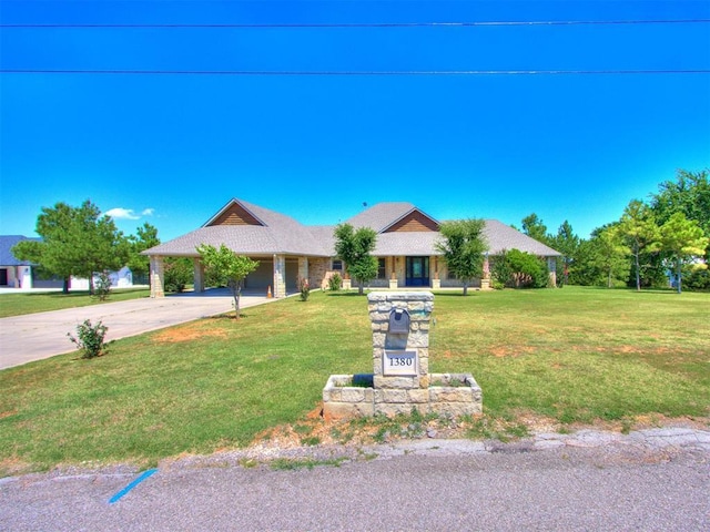 view of front facade with a front lawn and a garage