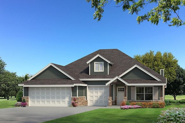 craftsman house featuring a front yard and a garage