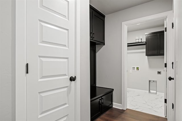 mudroom with dark hardwood / wood-style floors