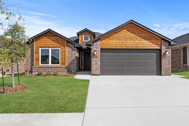 view of front of property with a front lawn and a garage