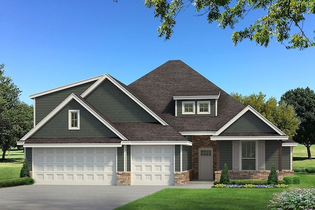 craftsman-style house featuring a front yard and a garage