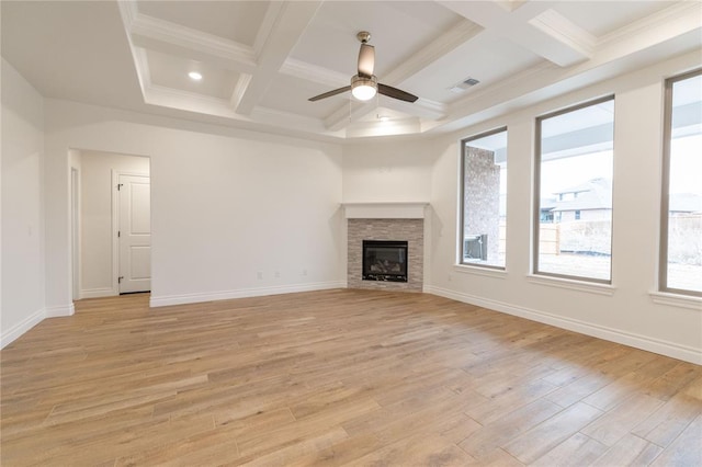 unfurnished living room with baseboards, coffered ceiling, a ceiling fan, light wood-style flooring, and a fireplace