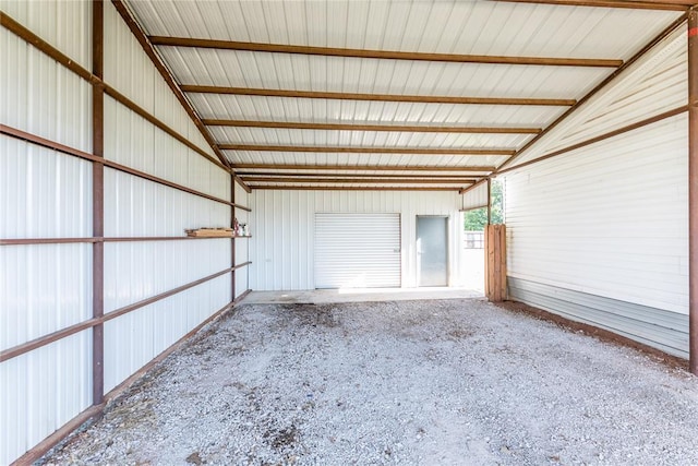 306 E Ninth St, Leedey, OK 73654 - garage featuring metal wall