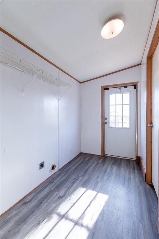 306 E Ninth St, Leedey, OK 73654 - washroom featuring electric dryer hookup, wood finished floors, and ornamental molding