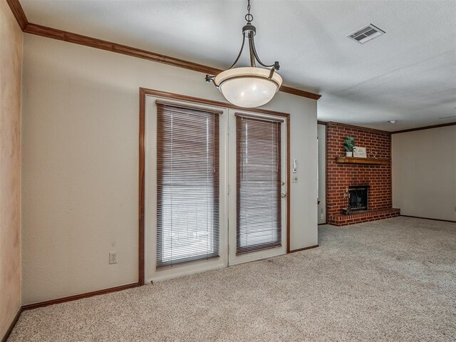 unfurnished living room with light colored carpet, a brick fireplace, and ornamental molding