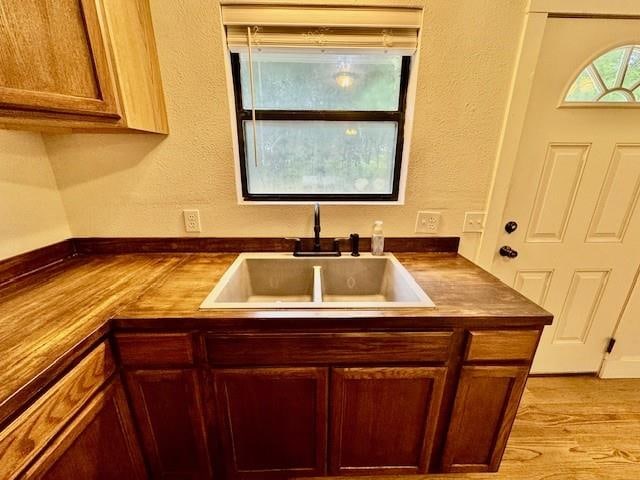 kitchen featuring sink and light hardwood / wood-style floors