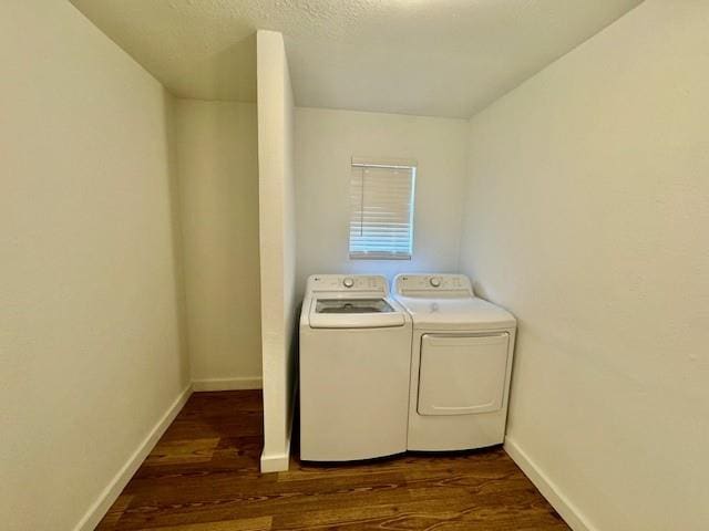 laundry room featuring dark hardwood / wood-style flooring and independent washer and dryer