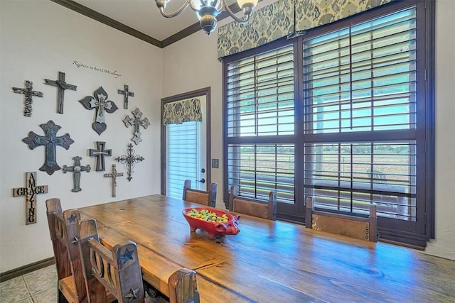 21321 E 1290th Rd, Sentinel, OK 73664 - tiled dining space featuring a chandelier, a healthy amount of sunlight, and ornamental molding