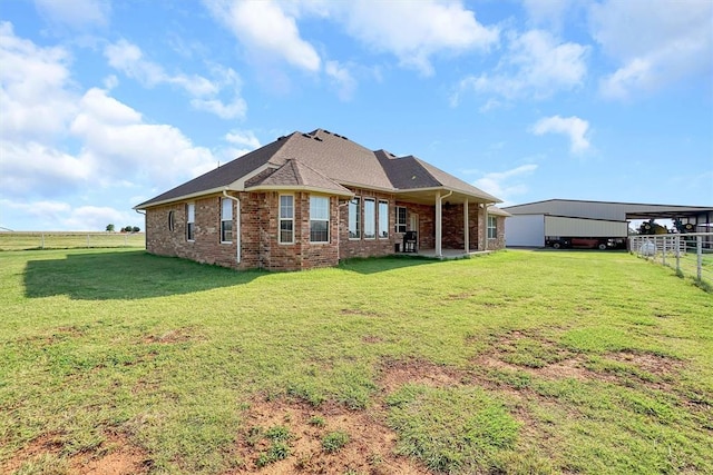 21321 E 1290th Rd, Sentinel, OK 73664 - rear view of property with a lawn