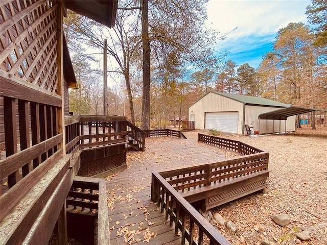 wooden terrace featuring a garage, a carport, and an outdoor structure