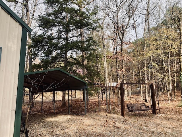 exterior space featuring a carport