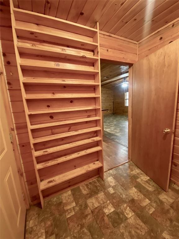 hallway featuring wooden ceiling