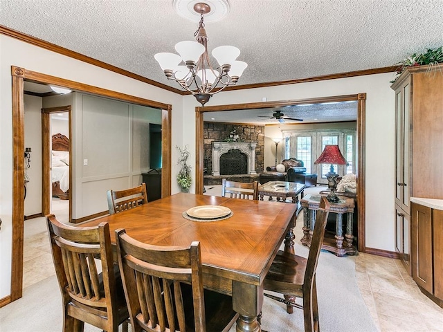 tiled dining room with crown molding, a fireplace, ceiling fan with notable chandelier, and a textured ceiling