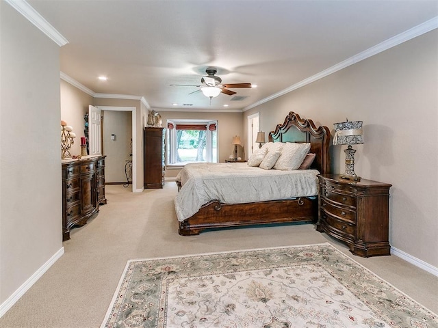 carpeted bedroom featuring ceiling fan and ornamental molding