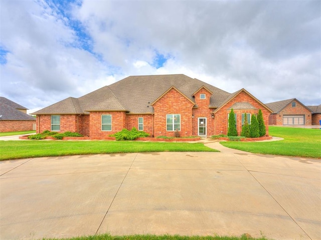 view of front of home with a front yard