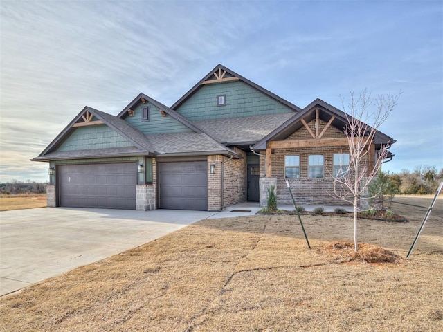 craftsman house with a garage