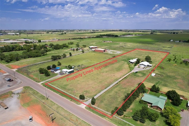 birds eye view of property featuring a rural view