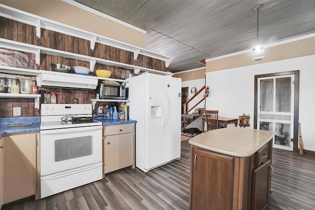 kitchen with range hood, decorative light fixtures, white appliances, a kitchen island, and ornamental molding