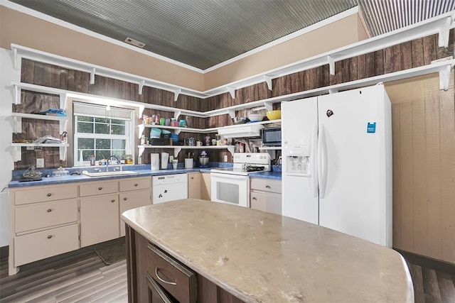 kitchen featuring white appliances, crown molding, dark wood-type flooring, sink, and white cabinetry