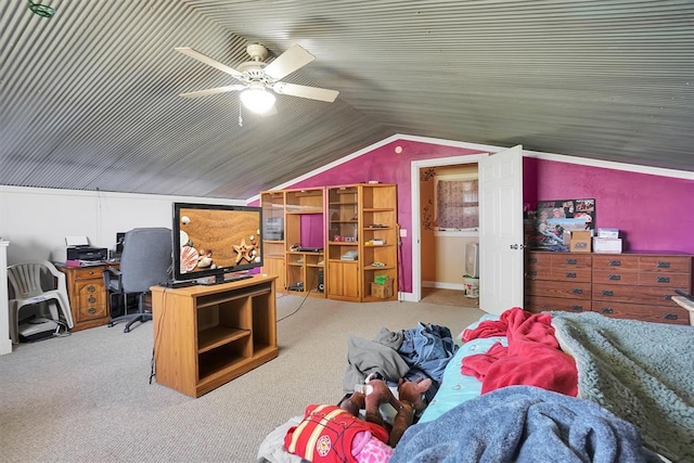 carpeted bedroom with ceiling fan and lofted ceiling