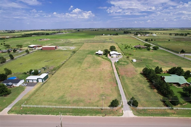 birds eye view of property featuring a rural view