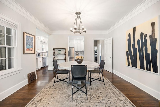 dining area with a chandelier, crown molding, and dark wood-type flooring