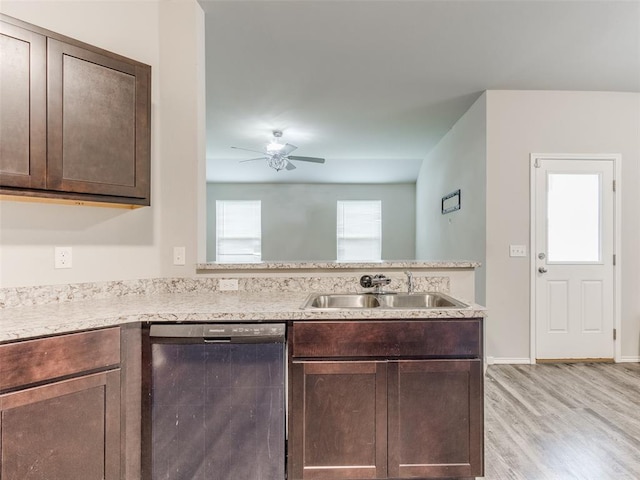 kitchen with ceiling fan, sink, black dishwasher, light hardwood / wood-style floors, and dark brown cabinets