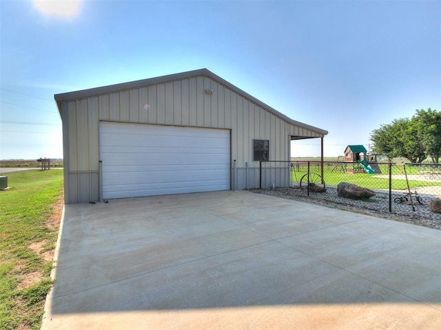 garage featuring a yard