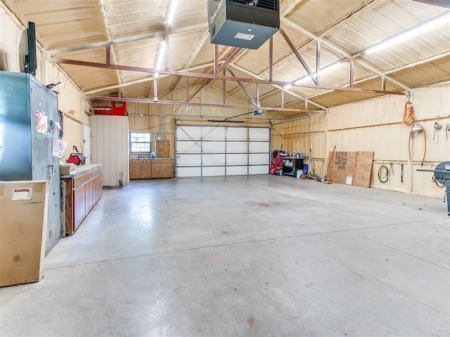 garage featuring a garage door opener