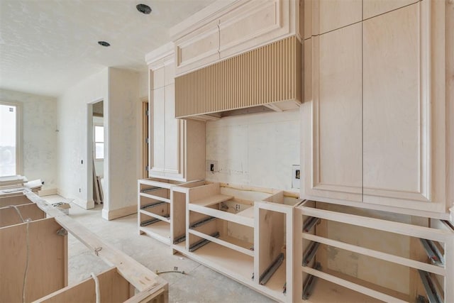 kitchen featuring light brown cabinetry