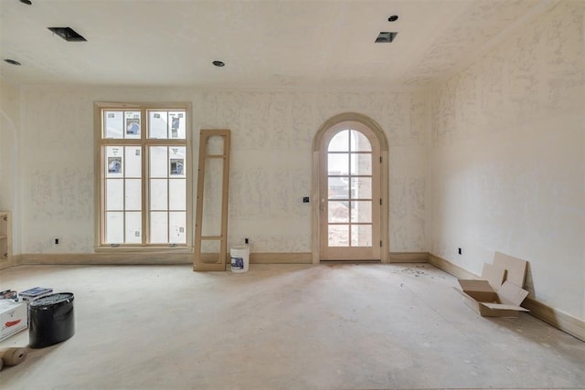 spare room with a wealth of natural light