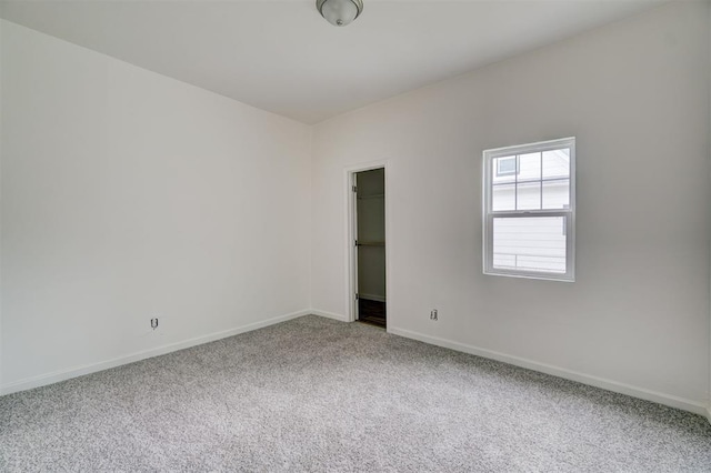 unfurnished room featuring carpet floors