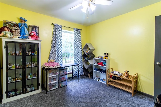 game room with carpet flooring and ceiling fan