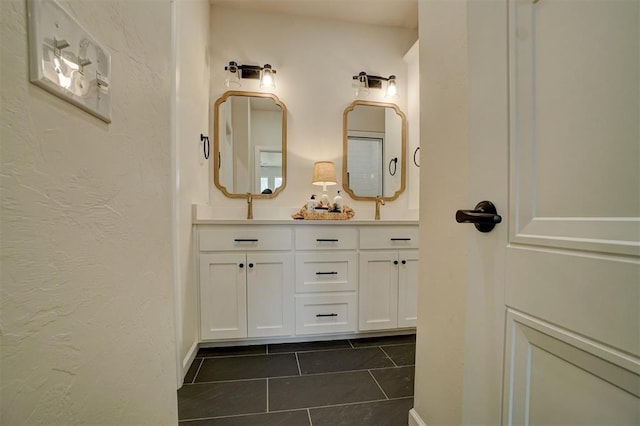 bathroom featuring tile patterned floors and vanity