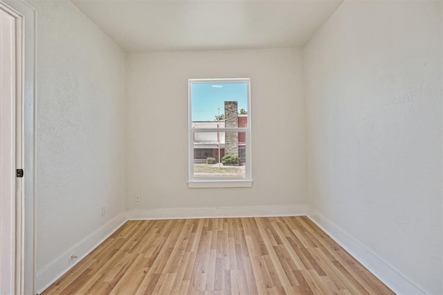 empty room with light wood-type flooring