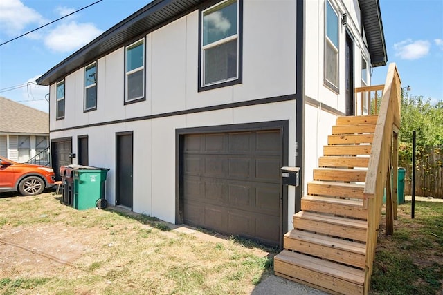 view of property exterior featuring a garage