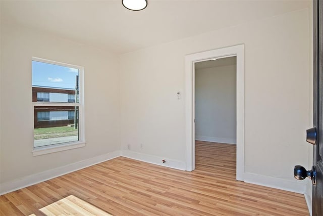 empty room with light wood-type flooring