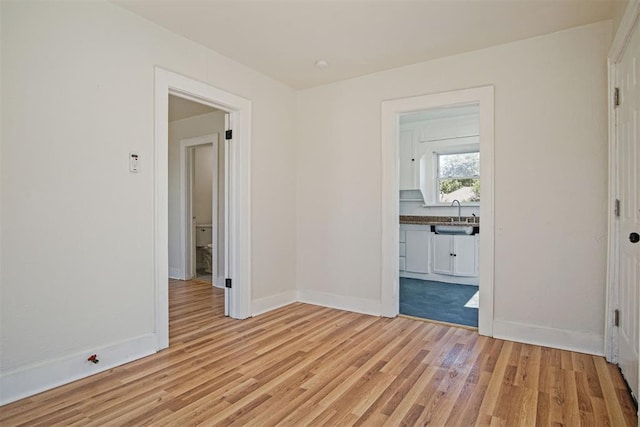 unfurnished room featuring light wood-type flooring