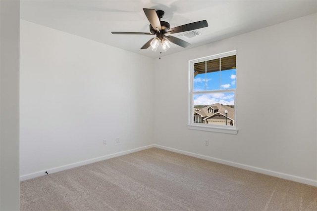 carpeted empty room with ceiling fan